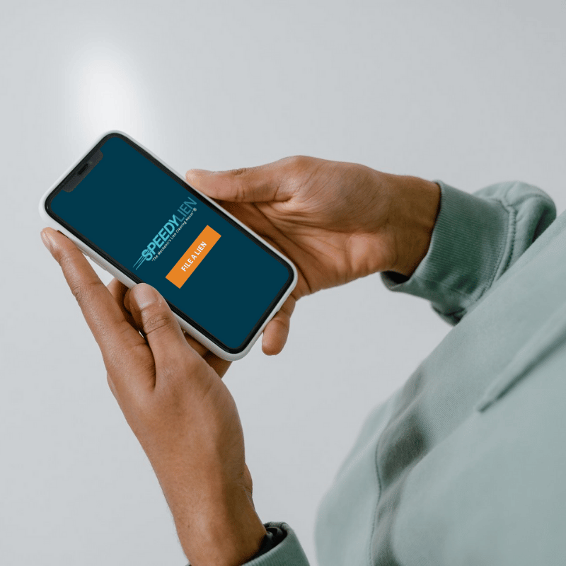 speedy-lien-mobile-form A mobile user reviewing mechanic's lien forms with Speedy Lien